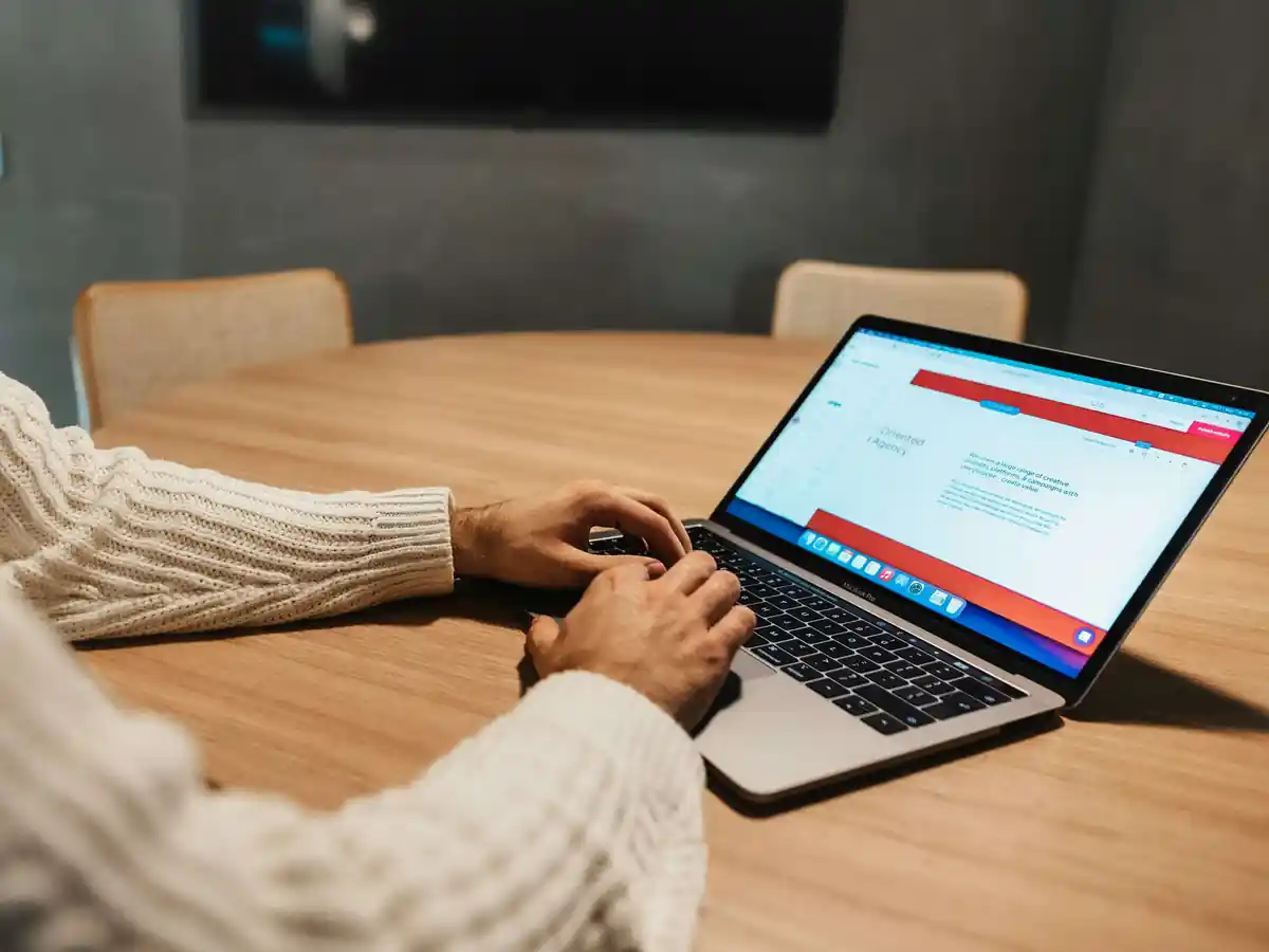 A business website being read on a laptop