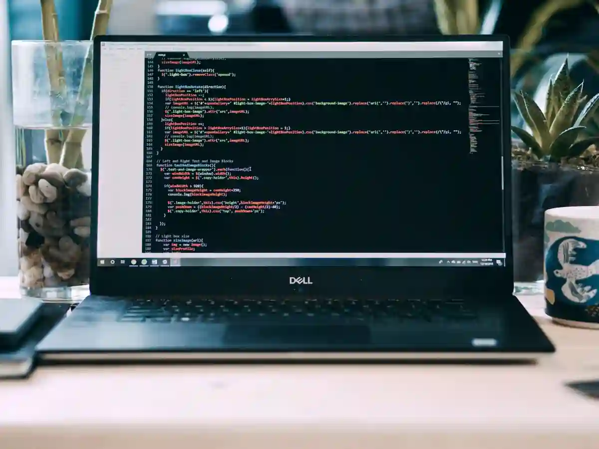 A website layout being reworked on a laptop